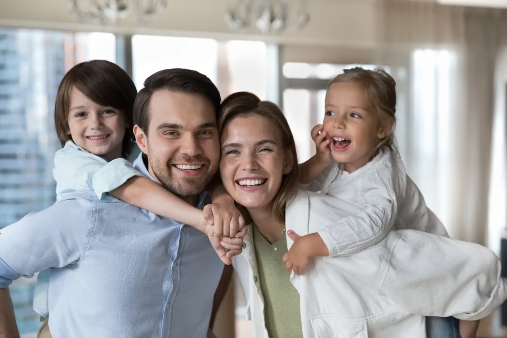 Smiling family representing comfortable dentist care at A+ Family Dentistry in San Diego